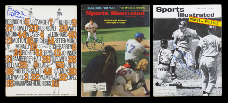BROOKS ROBINSON SIGNED PUBLICATIONS AND 1970 WORLD SERIES PROGRAM