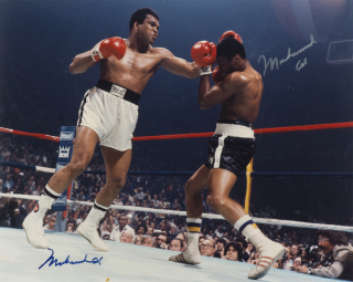 MUHAMMAD ALI VS JIMMY YOUNG TWICE SIGNED PHOTOGRAPH
