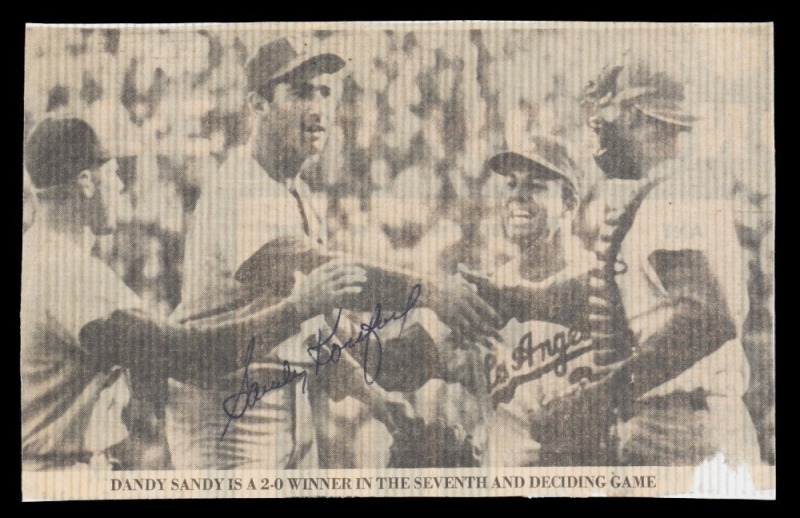 SANDY KOUFAX SIGNED 1965 WORLD SERIES NEWSPAPER CUT