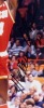 HAKEEM OLAJUWON SIGNED PHOTOGRAPH GROUP OF THREE WITH YOUTH JERSEY - 3