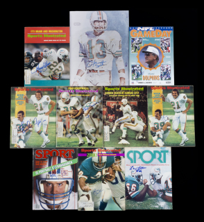 MIAMI DOLPHINS SIGNED PUBLICATIONS AND PHOTOGRAPH GROUP OF 10