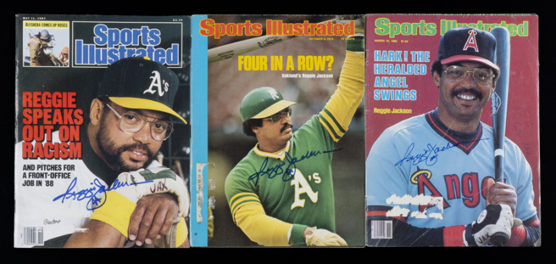 REGGIE JACKSON 1970s AND 1980s SIGNED SPORTS ILLUSTRATED GROUP OF THREE