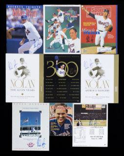 NOLAN RYAN SIGNED PUBLICATIONS AND PHOTOGRAPH GROUP OF NINE